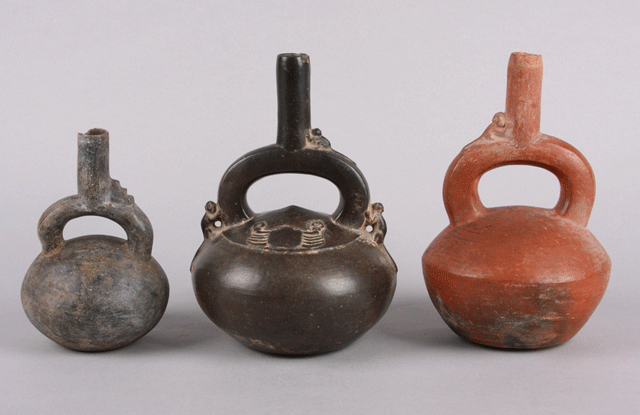 Three late stirrup-spout jars