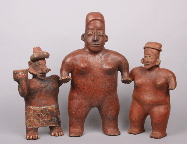 Three figurines of women